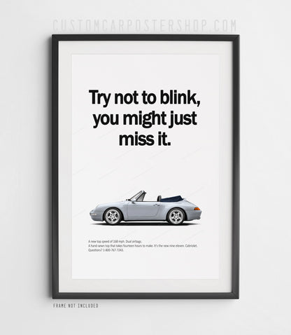 Remastered Porsche 911 Carrera Cabriolet (993) “Try not to blink” print advertisement poster featuring an Arctic Silver Euro-spec cabriolet in side profile.