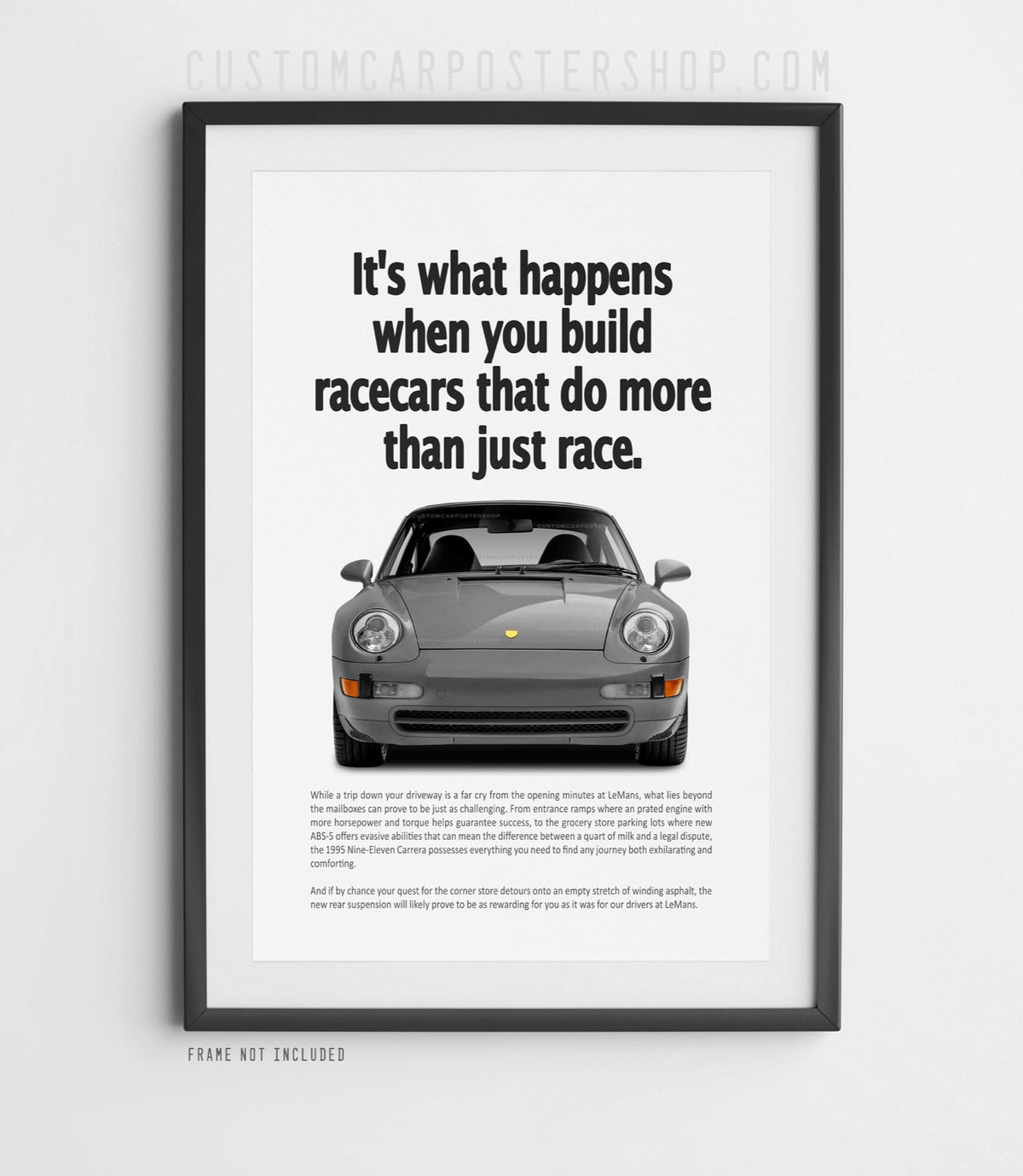 Porsche 911 Carrera (993) retro ad poster “Do More Than Just Race” in Grey, capturing the 993 Carrera head-on with its smooth ellipsoid headlamps.