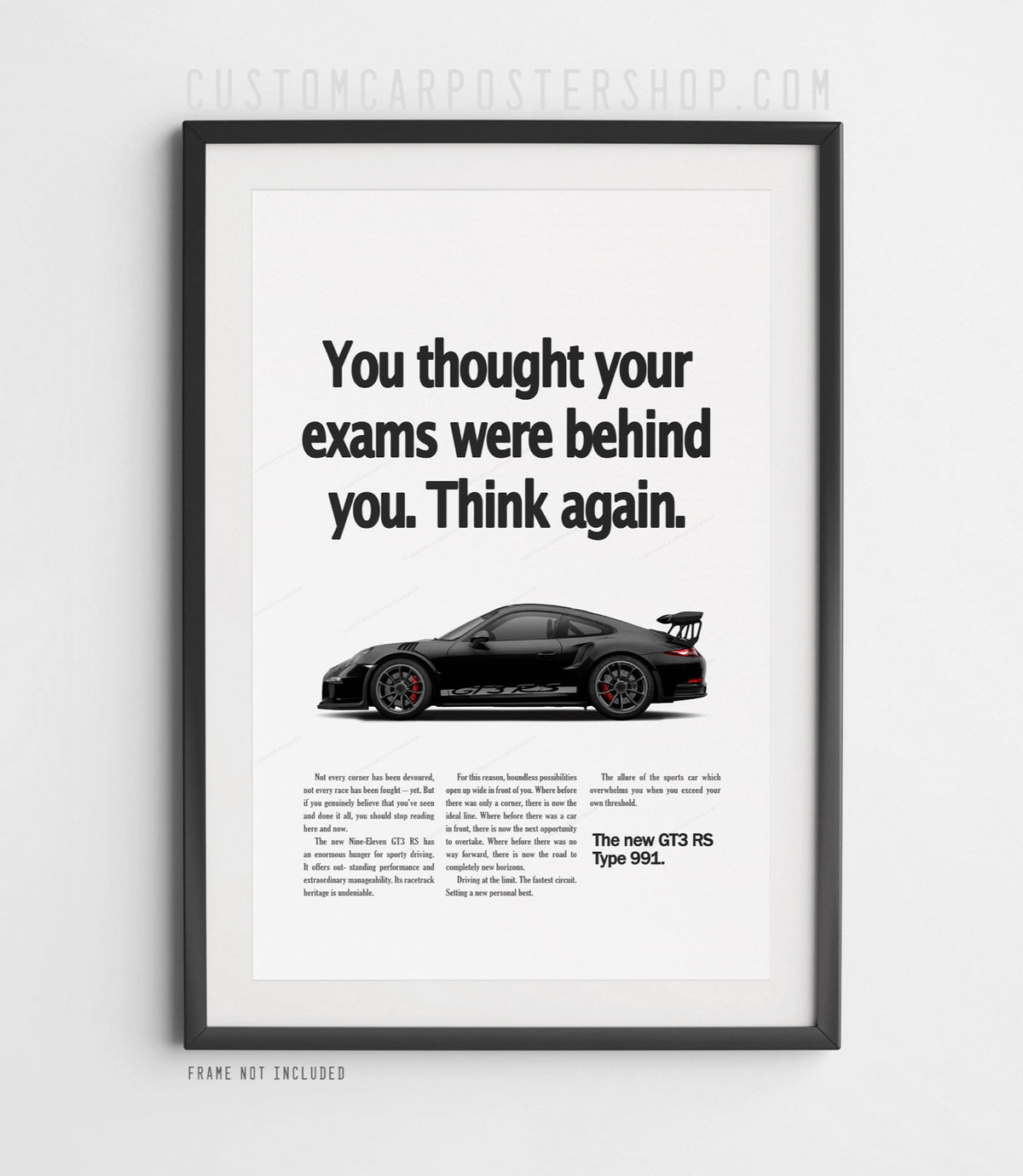 Black Porsche 911 GT3 RS (991) with towering rear wing on the ‘Think Again’ retro ad print.