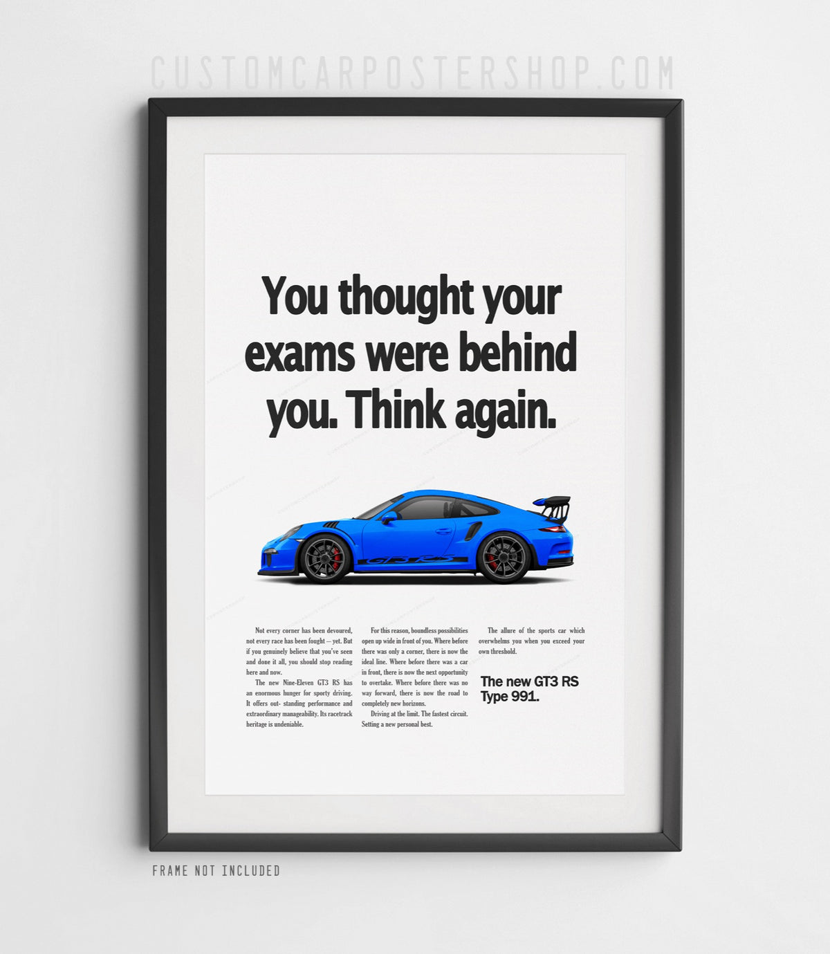 Blue Porsche 911 GT3 RS (991) with large rear wing on the ‘Think Again’ retro print ad.