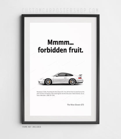 Porsche 996.2 911 GT3 in side profile with its iconic rear wing beneath “Mmmm... forbidden fruit.” typography on a minimalist remastered Porsche print ad.