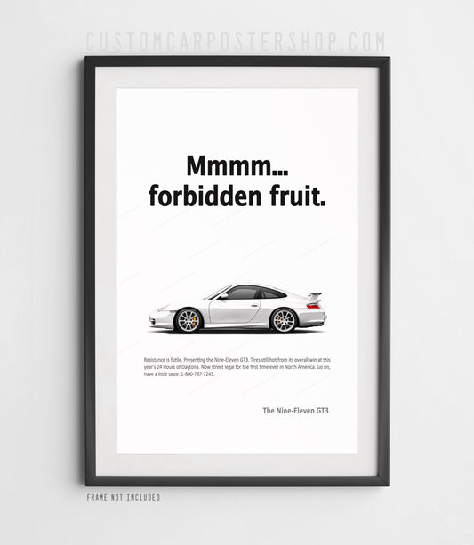 Porsche 996.2 911 GT3 in side profile with its iconic rear wing beneath “Mmmm... forbidden fruit.” typography on a minimalist remastered Porsche print ad.
