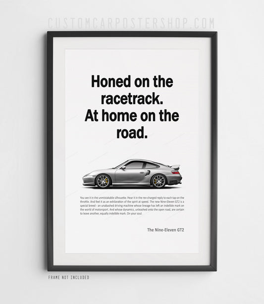 Porsche 996.2 GT2 remastered poster featuring a silver 911 GT2 with “Honed on the racetrack. At home on the road.” headline