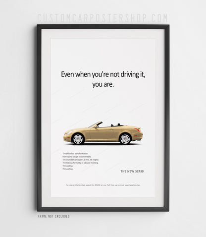 Lexus SC430 remastered advertisement poster featuring a gold hardtop convertible and the slogan "Even When You're Not Driving It, You Are"