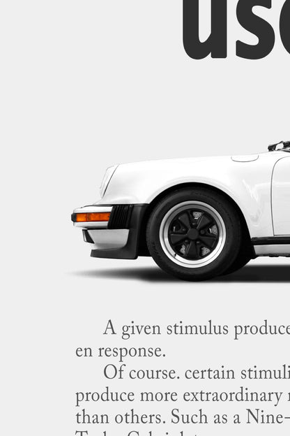 Close-up detail of the remastered Porsche 911 Turbo Cabriolet (930) “Pavlov” print ad showing the white front end, Fuchs wheel and body copy.