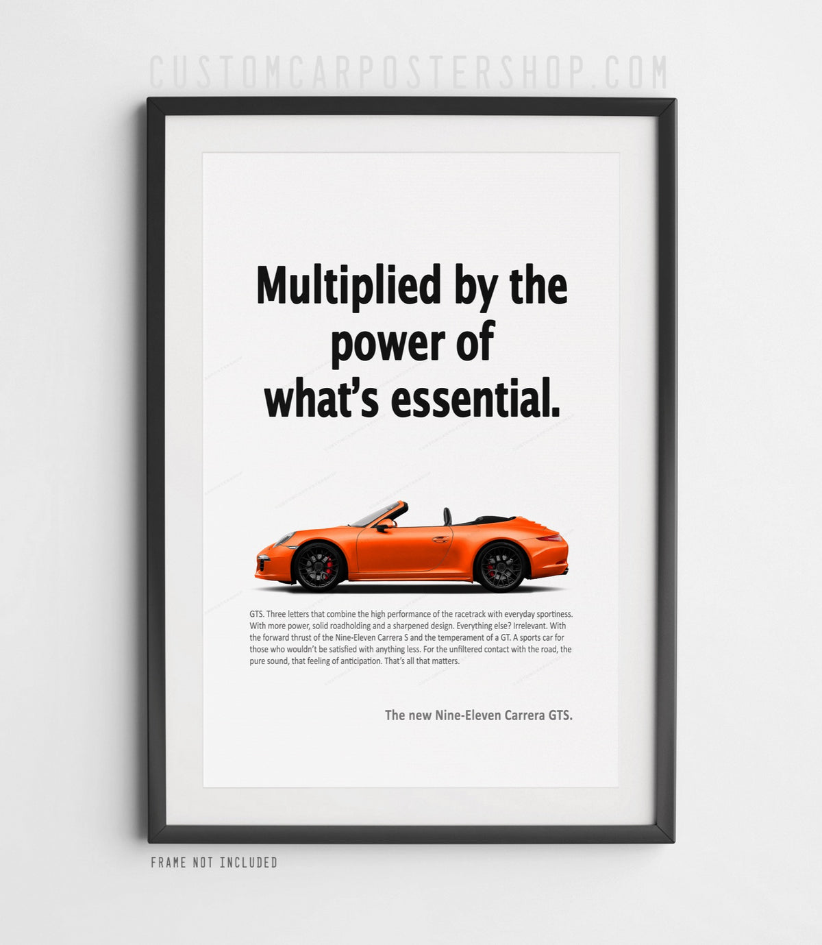 Remastered ‘Power of What’s Essential’ print ad showing an orange 991.1 Carrera GTS Cabriolet in side profile.