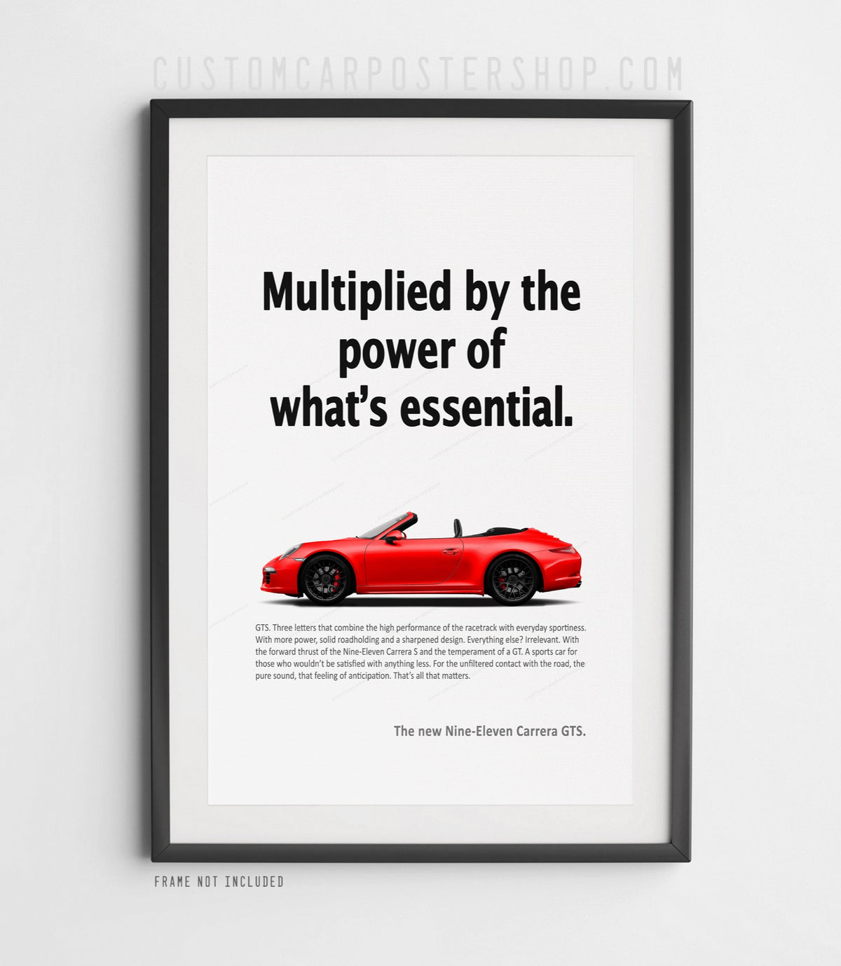 Red Porsche 911 Carrera GTS Cabriolet (991.1) in profile on the ‘Power of What’s Essential’ framed retro print ad.