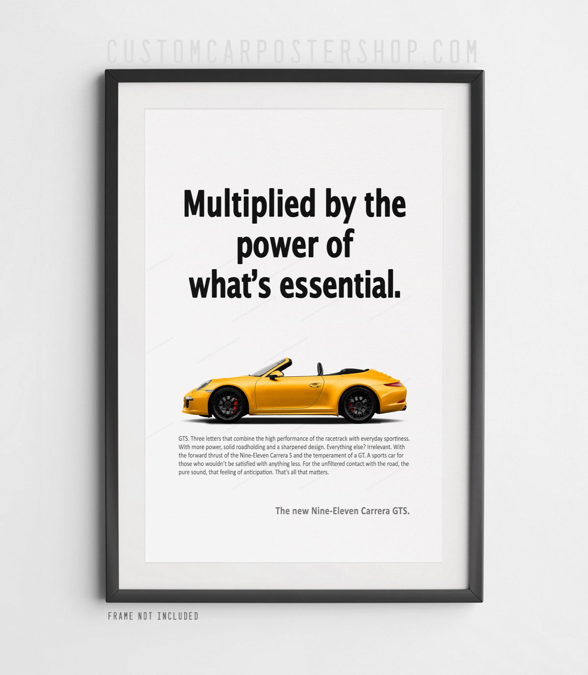 Yellow Porsche 911 Carrera GTS Cabriolet in side profile beneath the ‘Power of What’s Essential’ headline on a remastered retro print ad.